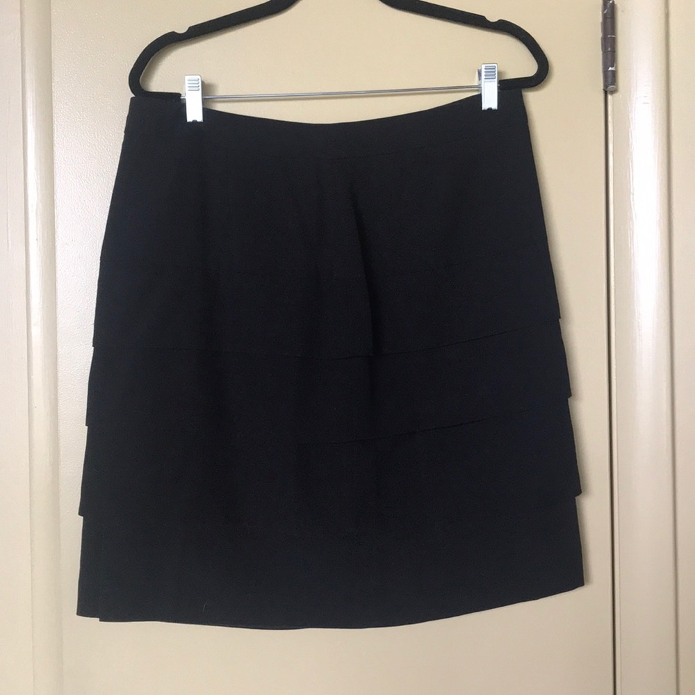 Black layered mini skirt with stretch.